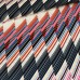 Polyester stretch wit met zwart/blauw/rode schuine strepen Polyester stretch wit met zwart/blauw/rode schuine strepen